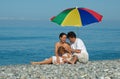 Family with child on a beach Royalty Free Stock Photo