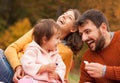 Family with child on picnic in autumn park. Royalty Free Stock Photo