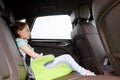 Family with child in safety seat driving car Royalty Free Stock Photo
