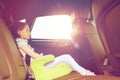 Family with child in safety seat driving car Royalty Free Stock Photo