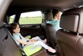 Family with child in safety seat driving car Royalty Free Stock Photo