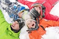 Family and child spending time outdoor in winter