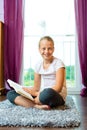 Family - child or teenager reading a book