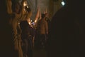 Family with Child Watching Nazarenos in Holy Week Silence Procession