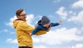 Father with son playing and having fun outdoors Royalty Free Stock Photo