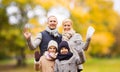 Happy family in autumn park Royalty Free Stock Photo