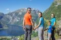 Family with children above Geiranger Fjord. Royalty Free Stock Photo