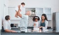 Family, children and baking with a senior man bonding with his granddaughter in the kitchen of a home. Love, grandparent Royalty Free Stock Photo