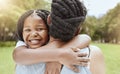 Family, children and hugging with a mother and daughter in a nature park or garden while spending time together. Summer Royalty Free Stock Photo