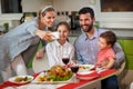 Family with children making Christmas selfie at the set table Royalty Free Stock Photo