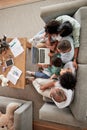 Family, children and video call with kids, parents and grandparents using a laptop on the sofa at home. Communication Royalty Free Stock Photo