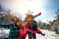 Family with children on winter ski vacation