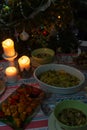 Family christmas evening dinner three candle on table Royalty Free Stock Photo