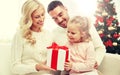 Happy family at home with christmas gift box Royalty Free Stock Photo