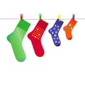 Family Christmas Socks on Clothesline with Pegs Royalty Free Stock Photo