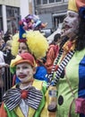 Family in colorful clown costume during the annual Carnival in Greece