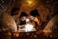 Family concept. elder sister and sister reading book with flashlight together before bedtime. Sister read story book together in Royalty Free Stock Photo