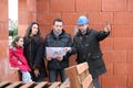 Family on a construction site Royalty Free Stock Photo