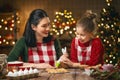 Family cooking Christmas cookies Royalty Free Stock Photo