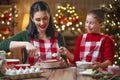 Family cooking Christmas cookies Royalty Free Stock Photo