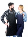 Family cooking grilled food. Cooking together. Couple in love getting ready for barbecue. Man bearded guy and girl ready Royalty Free Stock Photo