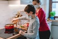 Family cooking at home during coronavirus crisis Royalty Free Stock Photo