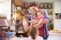 Family Cooking Meal In Kitchen Together Royalty Free Stock Photo