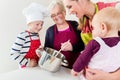 Family cooking in multigenerational household Royalty Free Stock Photo