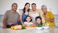 Family, cooking and vegetable, learning and teaching, development and growth, generations together in home. Health Royalty Free Stock Photo