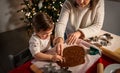 mother and daughter making gingerbread at home Royalty Free Stock Photo