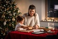 mother and daughter making gingerbread at home Royalty Free Stock Photo