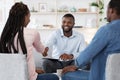 Family Counselor Shaking Hands With Happy Black Couple After Successful Therapy Royalty Free Stock Photo
