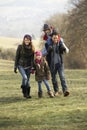 Family on country walk in winter Royalty Free Stock Photo