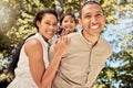 Family, couple and child being happy, smile and relax for fun, vacation and joy together outdoor. Portrait, man and Royalty Free Stock Photo