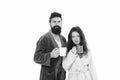 Family couple drink tea in bathrobe. couple in love. good morning coffee. man and woman drinking milk from cup. bearded