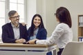 Family couple signing contract with manager in office Royalty Free Stock Photo