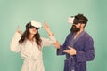 Family couple wear vr glasses. girl and man hipster relax in bathrobe. morning start with future technology. Another Royalty Free Stock Photo