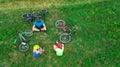 Family cycling on bikes outdoors aerial view from above, happy active parents with child have fun and relax, family sport Royalty Free Stock Photo