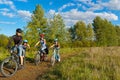 Family cycling outdoors Royalty Free Stock Photo