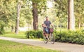 Family cycling outdoors - family on bicycles in park Royalty Free Stock Photo