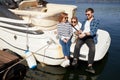 Family with daughter Fishing on yacht sailboat on lake