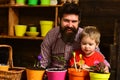 Family day. Greenhouse. bearded man and little boy child love nature. Father and son. Fathers day. happy gardeners with Royalty Free Stock Photo