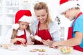 Family decorating christmas cookies