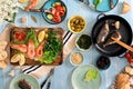 Family dinner table with shrimp, fish grilled, salad, different