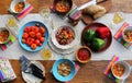 Family dinner variety of meals dishes with glass of wine on wooden table. Dinner table. a variety of snacks, festive Royalty Free Stock Photo