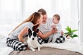 Family with dog in the bed Royalty Free Stock Photo