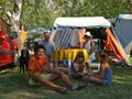 Family with dog at a camp Royalty Free Stock Photo