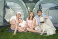 Family with dog in tent Royalty Free Stock Photo