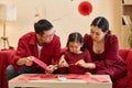 Family doing Calligraphy Together Royalty Free Stock Photo