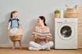 Family doing laundry Royalty Free Stock Photo